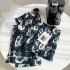 Pijama de una sola pieza de algodón con manga larga para hombres - Diseño moderno y cómodo para estar en casa