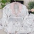 Nuevo conjunto de pijama de seda de hielo para mujeres con patrón de mantequilla, de manga larga, para el hogar o para vestir, con estampado posicional de alta gama para usar en público