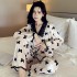 Otoño invierno grueso traje de pijama de terciopelo dorado mujer dulce cuello de muñeca pijamas con estampado de lazo al por mayor
